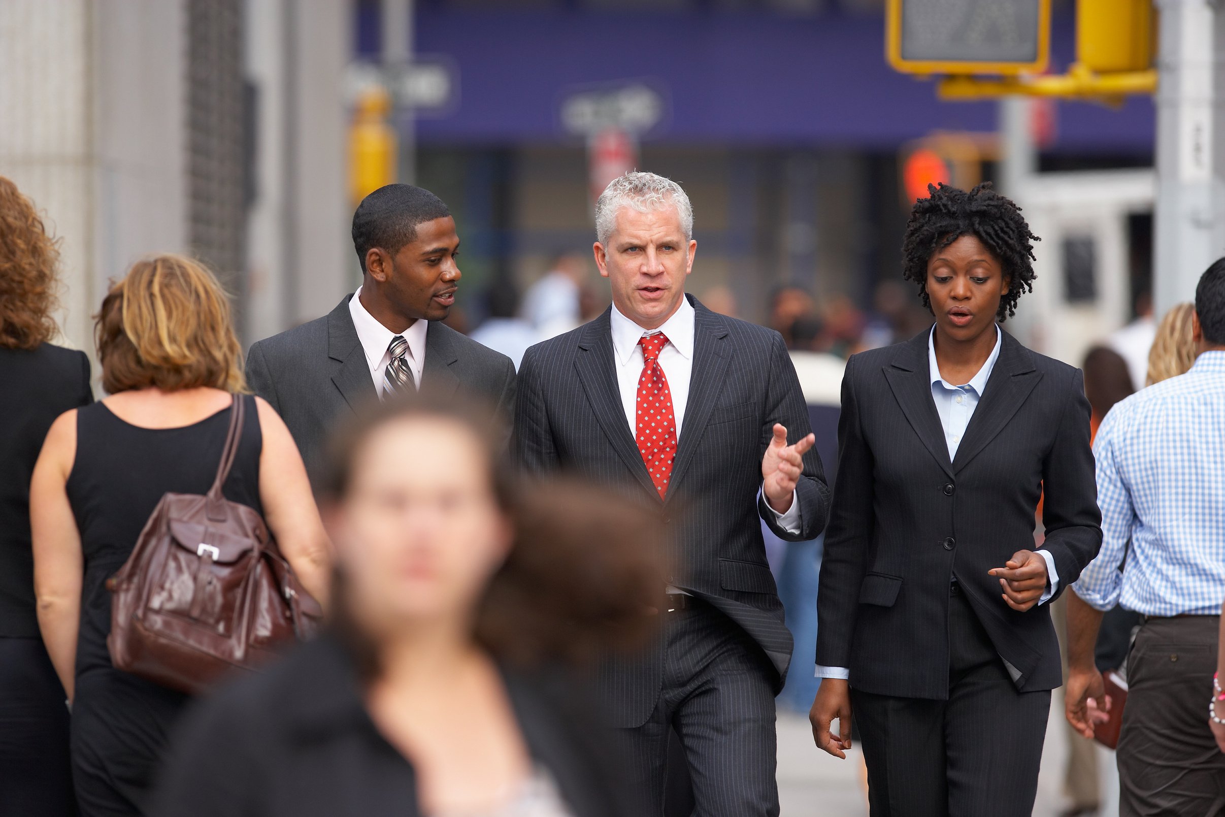 Businesspeople crossing street, Manhattan, New York City